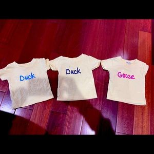 T shirts “duck” “duck” “goose”